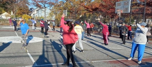Group of women exercising at the park
